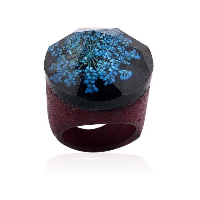 Bague résine et fleur bleu