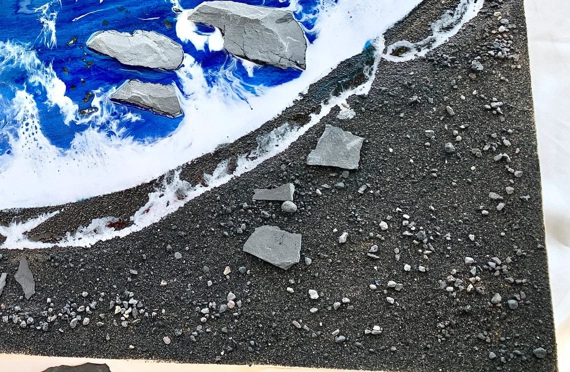 Tableau en résine de plage de sable noir