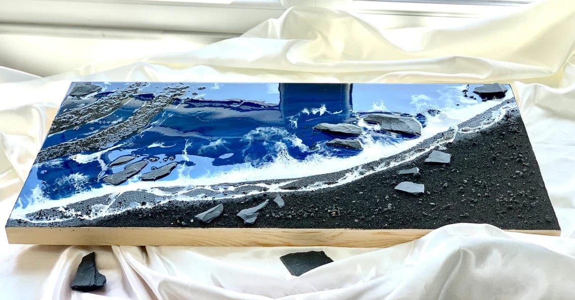 Tableau en résine de plage de sable noir