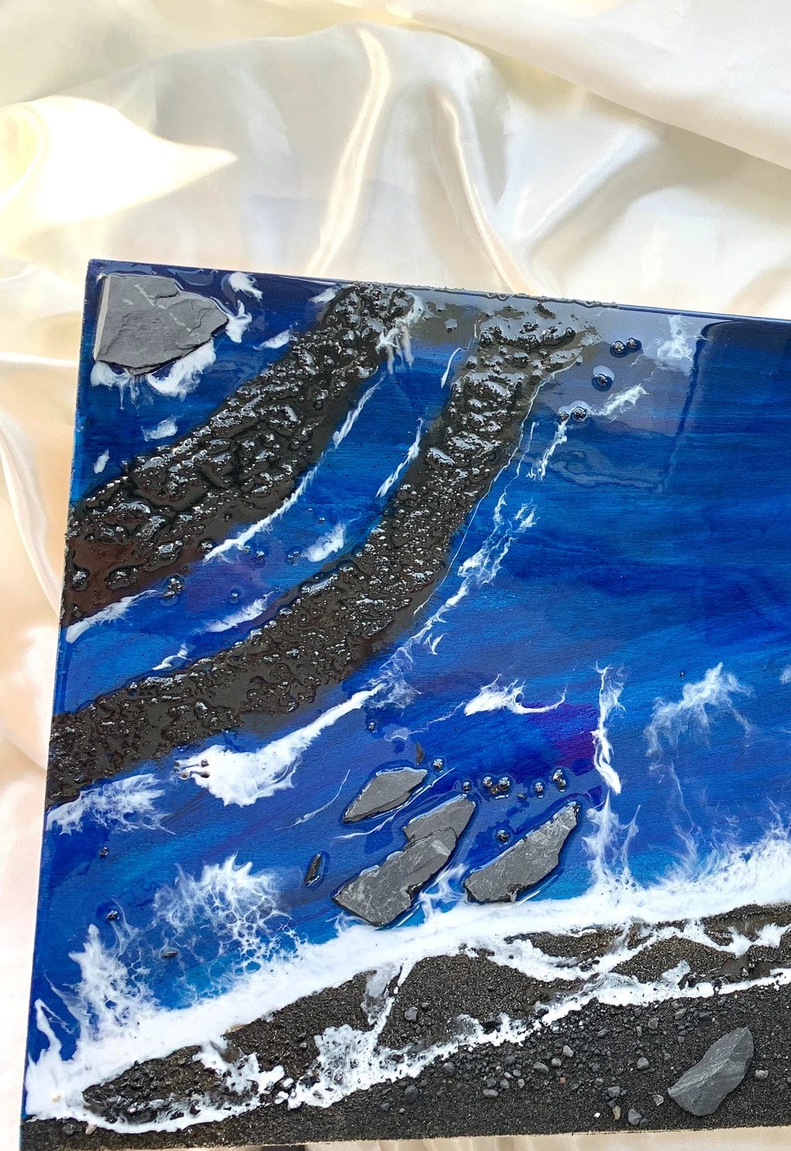 Tableau résine plage de sable noir